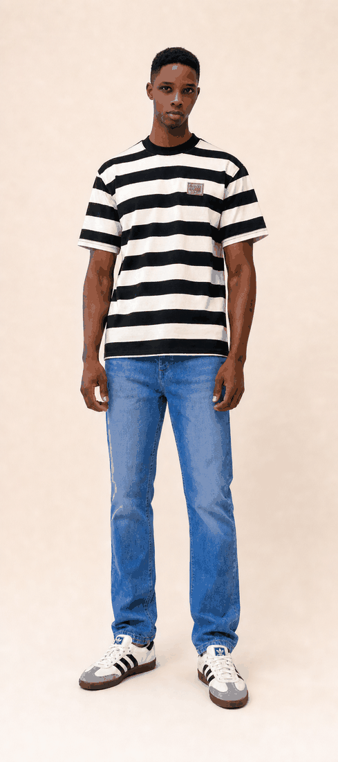 Striped T-shirt, blue jeans and sneakers styled on a Bravtone50 model